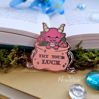 Pink Dragon in Dice Bag Enamel Pin