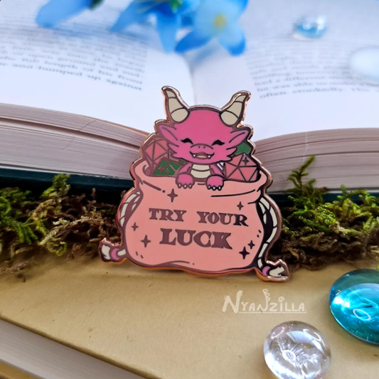 Pink Dragon in Dice Bag Enamel Pin